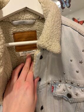 Levi's Light Wash Denim Jacket with Cream Sherpa and Silver Star Studs